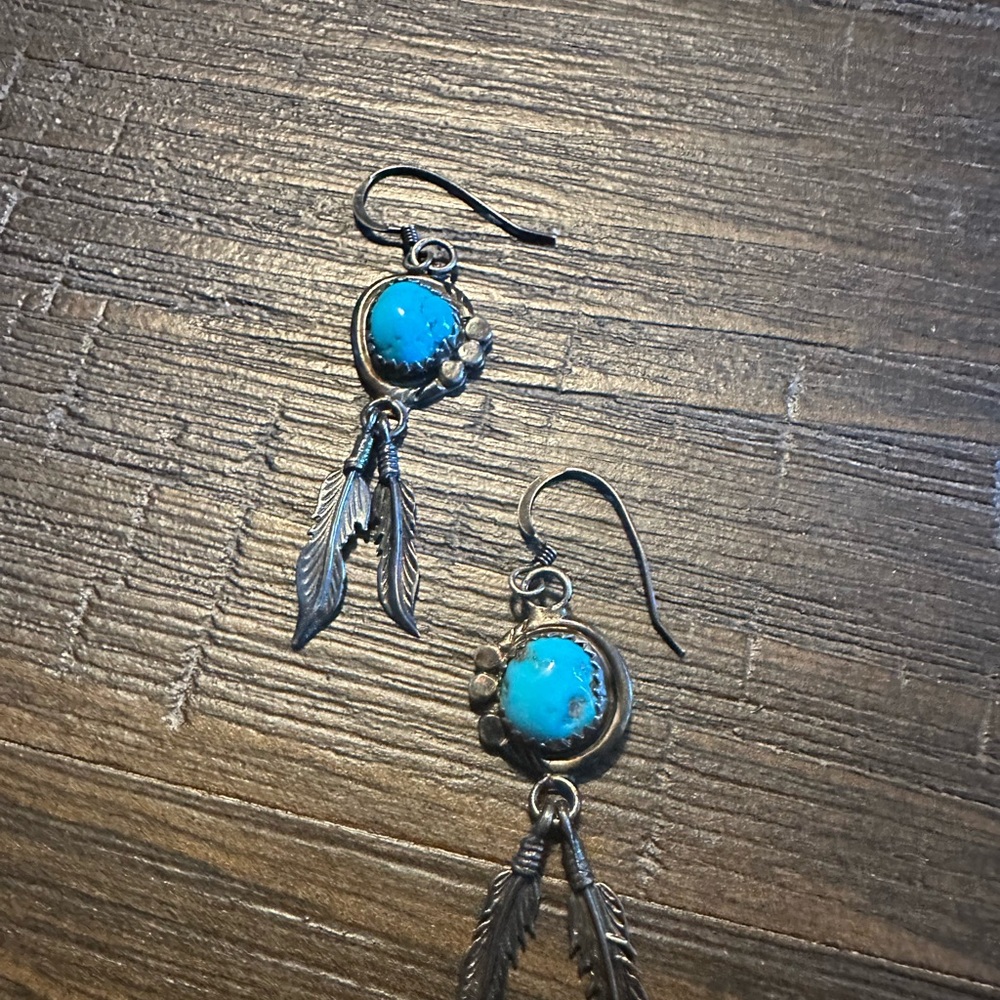 Turquoise earrings with feathers